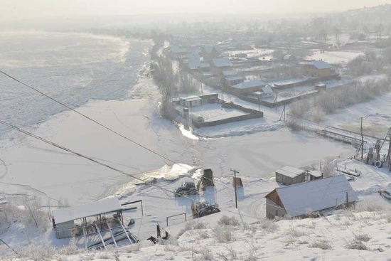 Зимнее подтопление села Подсинее в Хакасии. Фото Александра Колбасова